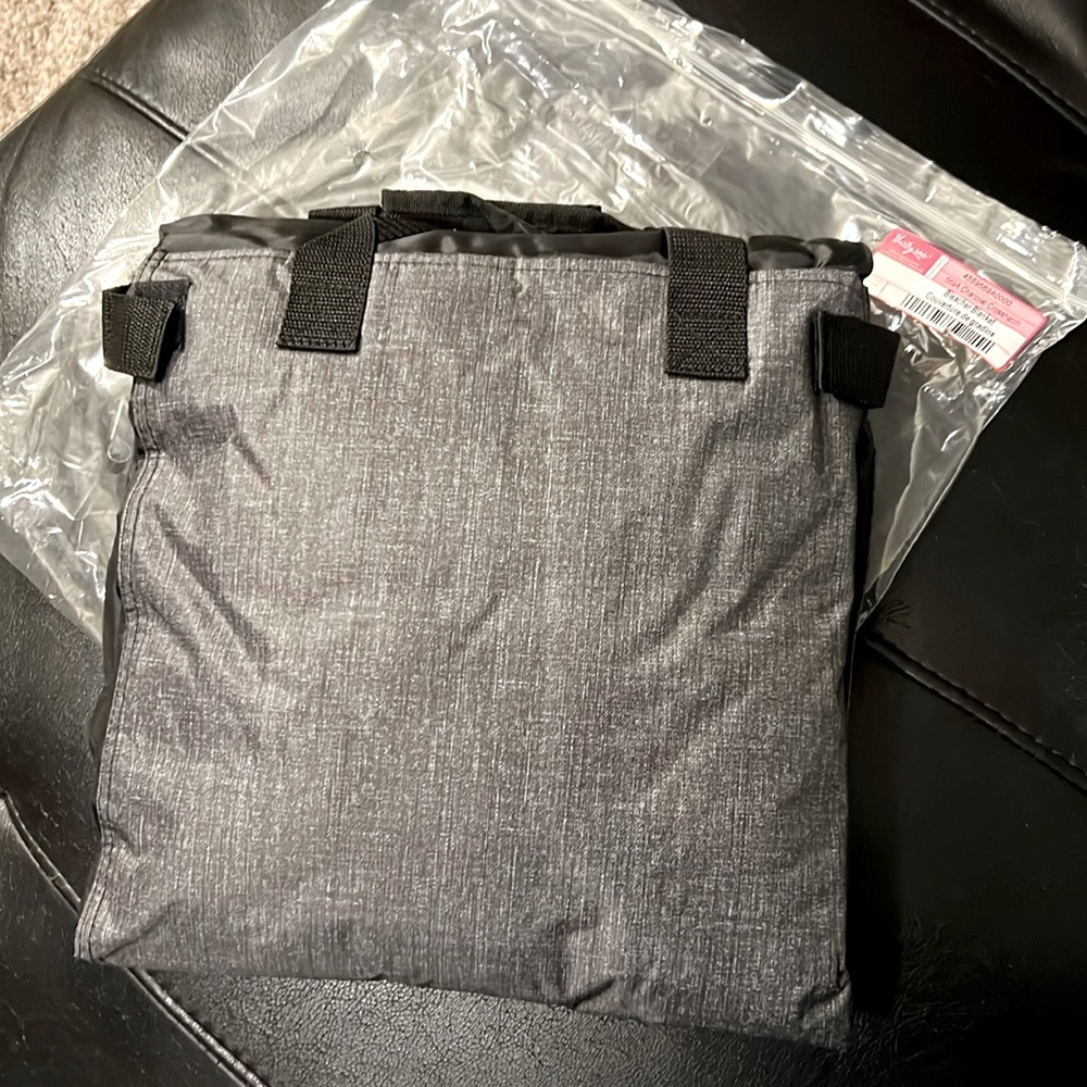 Thirty-one black bleacher, blanket. Folds up into easy to carry pillow.